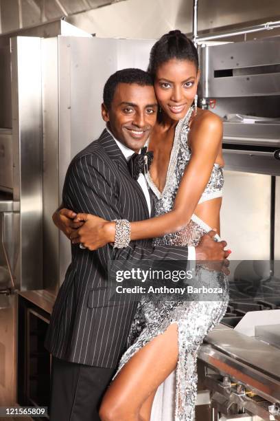Portrait of Ethiopian-born Swedish chef Marcus Samuelsson and his wife, model Maya Haile, as they pose together in a restaurant kitchen, 2010.