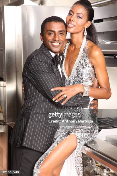 Portrait of Ethiopian-born Swedish chef Marcus Samuelsson and his wife, model Maya Haile, as they pose together in a restaurant kitchen, 2010.