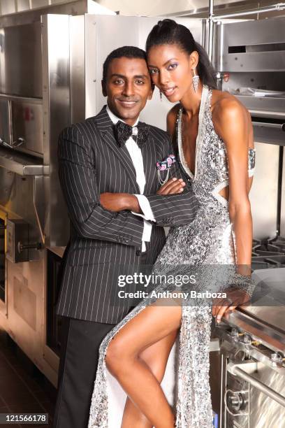 Portrait of Ethiopian-born Swedish chef Marcus Samuelsson and his wife, model Maya Haile, as they pose together in a restaurant kitchen, 2010.