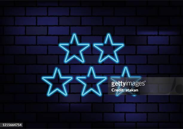 illustrations, cliparts, dessins animés et icônes de star shape blue neon light on dark brick wall - alphabet neon