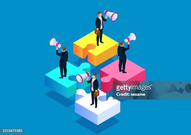 four businessmen holding megaphone standing on puzzles and shouting - good news stock illustrations