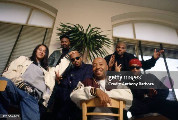 Portrait of American businessman Russell Simmons , New York, New York, 1990s. With him are, from left, an unidentified woman, film producer Nelson...