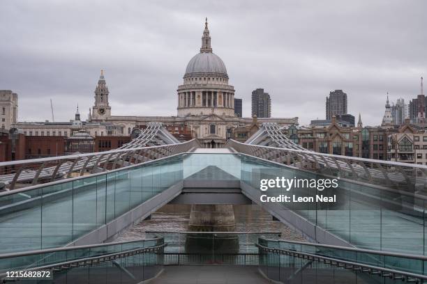 Deserted Millennium Bridge is seen during what would usually be the busy pre-9am rush-hour on March 30, 2020 in London, England. The Coronavirus...