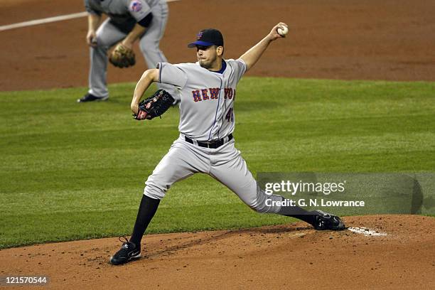 Mets starting pitcher Oliver Perez throws a pitch during game 4 of the NLCS between the New York Mets and St. Louis Cardinals at Busch Stadium in St....