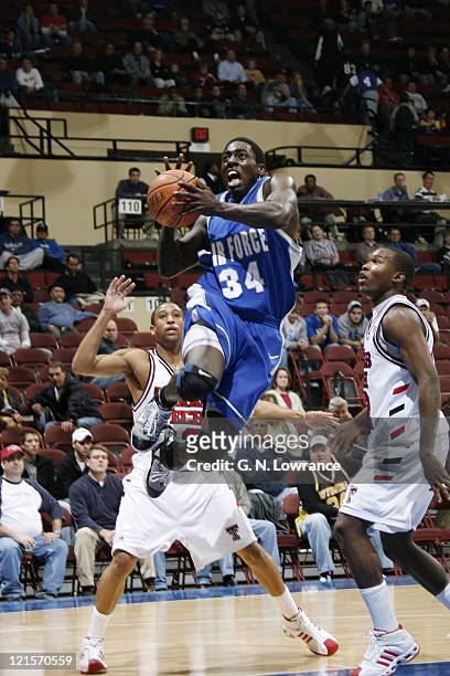 Dan Nwaelele of Air Force goes in for a bucket during the CBE Classic consolation game between Texas Tech and Air Force at Municipal Auditorium in...