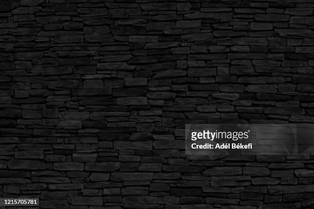 black brick wall - abundance tiles stock pictures, royalty-free photos & images