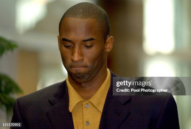 Kobe Bryant arrives at the Eagle County Courthouse with his attorney Pamela Mackey, for his preliminary hearing and bond appearance October 9, 2003...