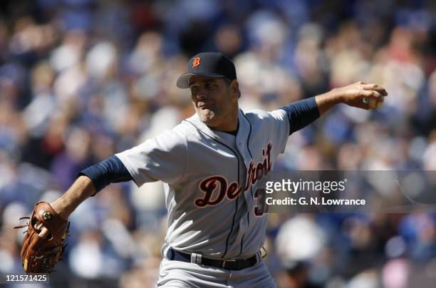 Starting pitcher Kenny Rogers of the Detroit Tigers throws a pitch during action on opening day against the Kansas City Royals at Kauffman Stadium in...