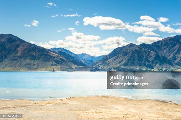 panoramic view nature landscape in queenstown with lake and mountains  south island new zealand - new zealand otago road stock pictures, royalty-free photos & images