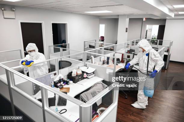 cleaning and disinfecting office - office cleaning stock pictures, royalty-free photos & images