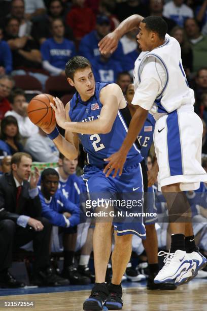 Josh McRoberts of Duke looks to pass during semi-final action between Air Force and Duke at the annual CBE Classic at Municipal Auditorium in Kansas...