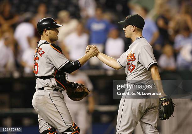 Baltimore catcher Ramon Hernandez and pitcher Chris Ray after the Orioles win over the Kansas City Royals at Kauffman Stadium in Kansas City,...