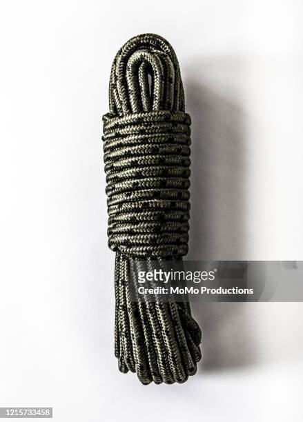 heavy-duty rope on white background - climbing rope stock-fotos und bilder