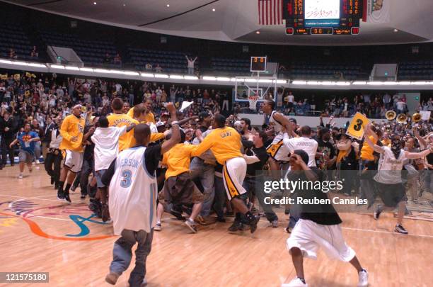 Fans of the Long Beach State 49ers celebrate after a 94 to 83 win over the Cal Poly Mustangs in the championship game of the Big West men's...
