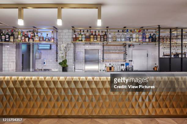 Bar and counter at Victory House Hotel. Victory House Hotel, London, United Kingdom. Architect: Michaelis Boyd Associates Ltd, 2017..