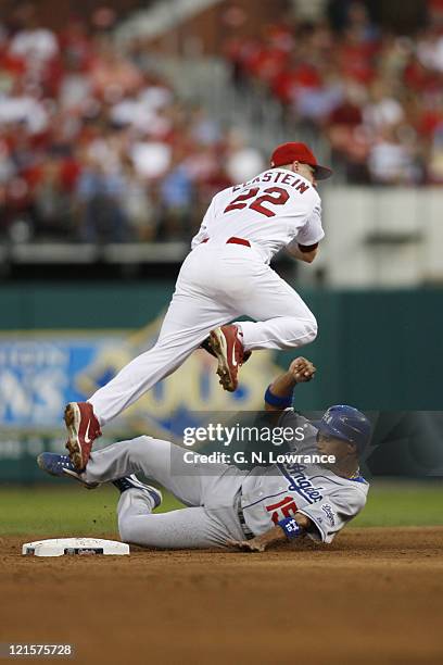 The Dodgers Rafael Furcal slides in under the Cardinals David Eckstein but was out on an attempted double play during action between the Los Angeles...