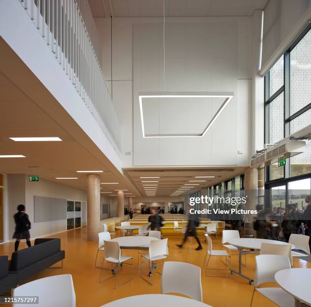 Triple height atrium. Bobby Moore Academy, London, United Kingdom. Architect: Penoyre & Prasad LLP, 2018..