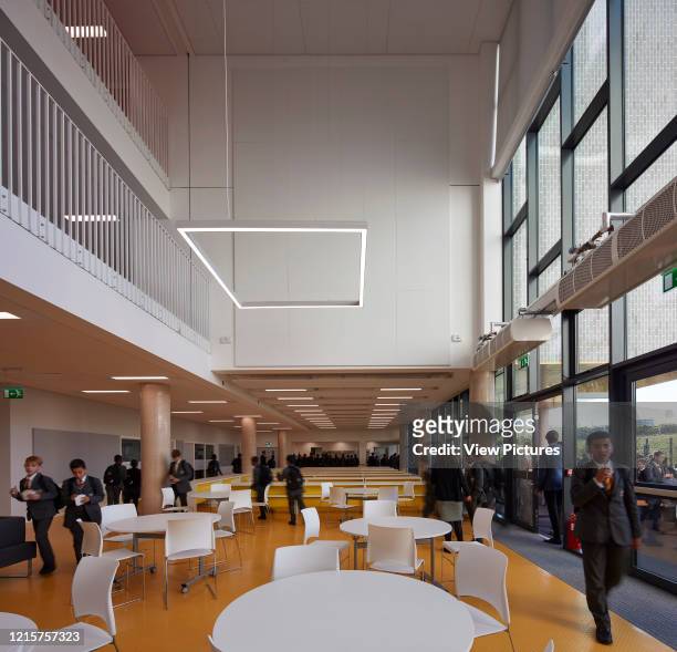 Triple height atrium. Bobby Moore Academy, London, United Kingdom. Architect: Penoyre & Prasad LLP, 2018..