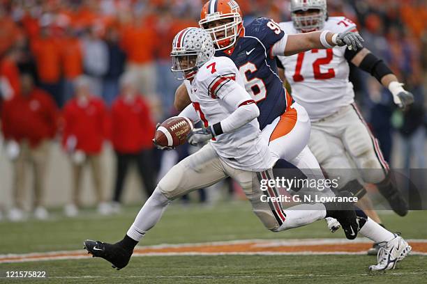 Ted Ginn Jr. Of Ohio State runs with a reception during action between the Ohio State Buckeyes and Illinois Fighting Illini at Memorial Stadium in...