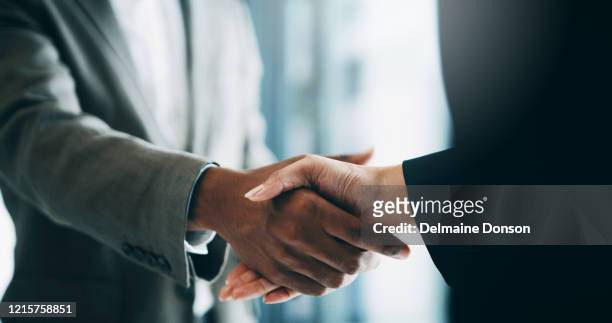 this merger will see the potential growth of our business - handshake stock pictures, royalty-free photos & images