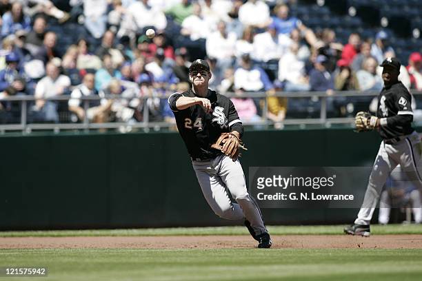 Joe Crede of the Chicago White Sox throws to make an out against the Kansas City Royals on April 24, 2005 at Kauffman Stadium in Kansas City,...