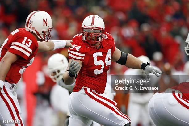 Offensive tackle Chris Patrick of Nebraska gets instructions from Zac Taylor during action between the Texas Longhorns and Nebraska Cornhuskers on...