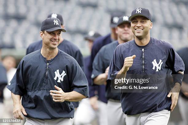 Tino Martinez and Derek Jeter of the New York Yankees before the game against the New York Yankees in Kansas City on May 31, 2005..