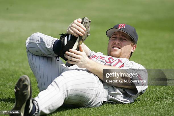 Lew Ford of the Minnesota Twins stretches out prior to a game against the Kansas City Royals at Kauffman Stadium in Kansas City, Mo on August 31,...