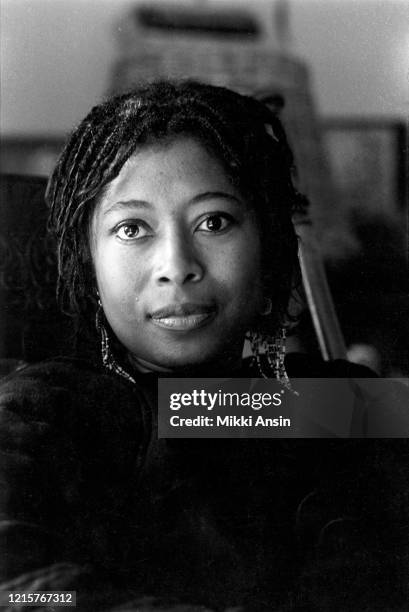 African American author Alice Walker , Best known for her novel 'The Color Purple', poses for portrait at home in San Francisco in January, 1985.