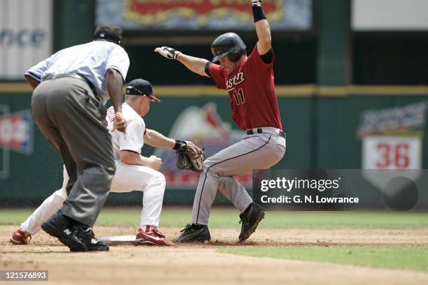 David Eckstein of the St. Louis Cardinals tags out Brad Ausmus at 2nd base during a game against the Houston Astros at Busch Stadium in St. Louis,...