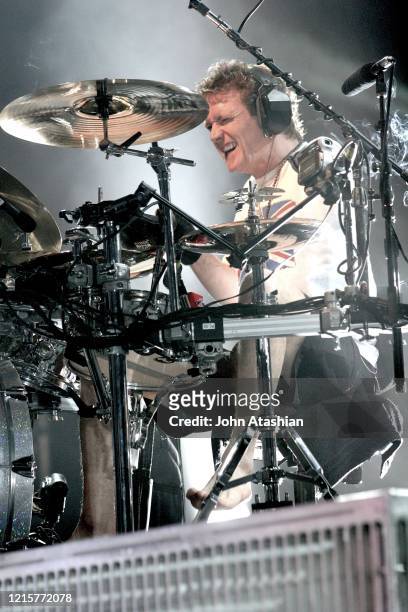 Drummer Rick Allen is shown performing on stage during a live concert appearance with Def Leppard on June 27, 2005.