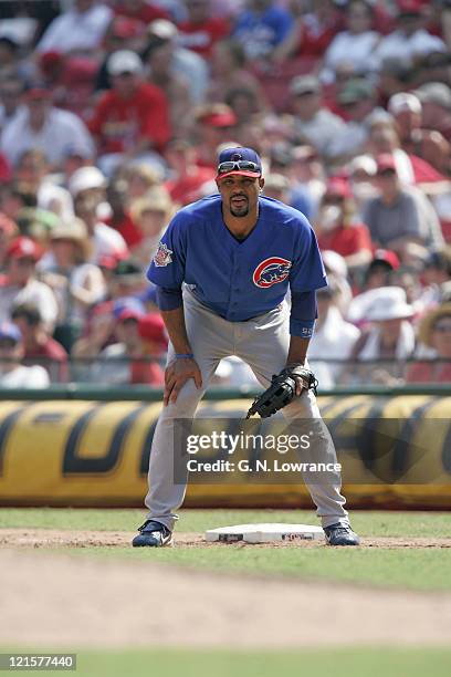 Derrek Lee of the Chicago Cubs waits for a pitch to be thrown during a game against the St. Louis Cardinals at Busch Stadium in St. Louis, Mo. On...