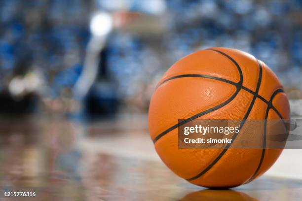 basketball on court - basketball court texture stock pictures, royalty-free photos & images