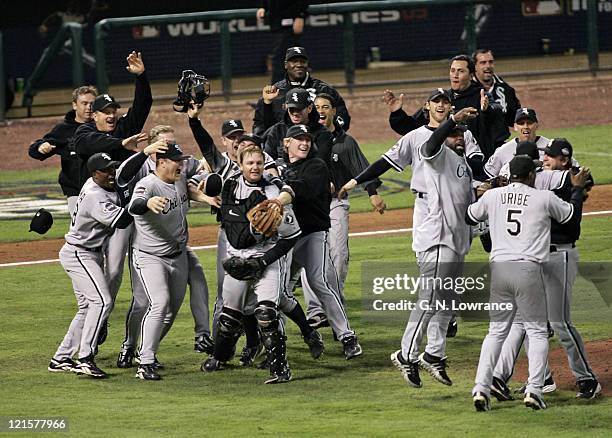 Members of the Chicago White Sox celebrate on the field after winning the 2005 World Series with a 1-0 win over the Houston Astro's at Minute Maid...