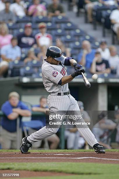 Shannon Stewart of the Minnesota Twins gets a hit against the Kansas City Royals at Kauffman Stadium in Kansas City, Missouri on July 7, 2005. The...