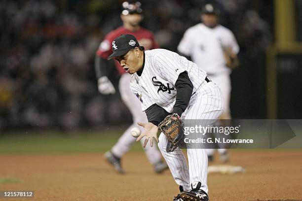 Tadahito Iguchi of the Chicago White Sox fields a ball during game 2 of the World Series against the Houston Astros at US Cellular Field in Chicago,...