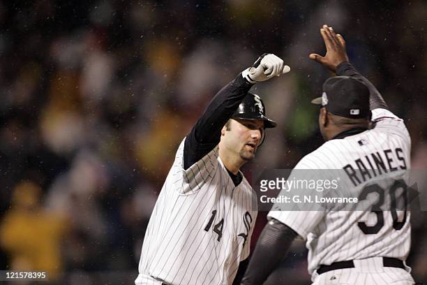 Paul Konerko of the Chicago White Sox celebrates hitting a grand slam in the 7th inning during game 2 of the World Series against the Houston Astros...