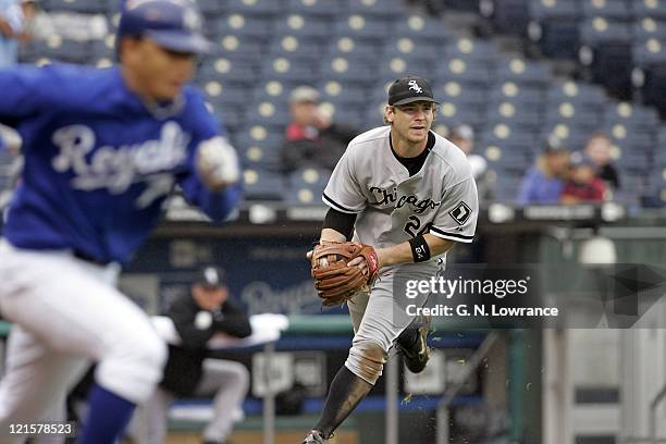 Third baseman Joe Crede of the Chicago White Sox fields a ground ball during a game against the Kansas City Royals at Kauffman Stadium in Kansas...