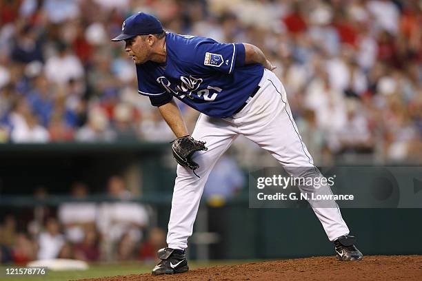 Mark Redman of the Royals looks in for the sign during action between the St. Louis Cardinals and Kansas City Royals at Kauffman Stadium in Kansas...