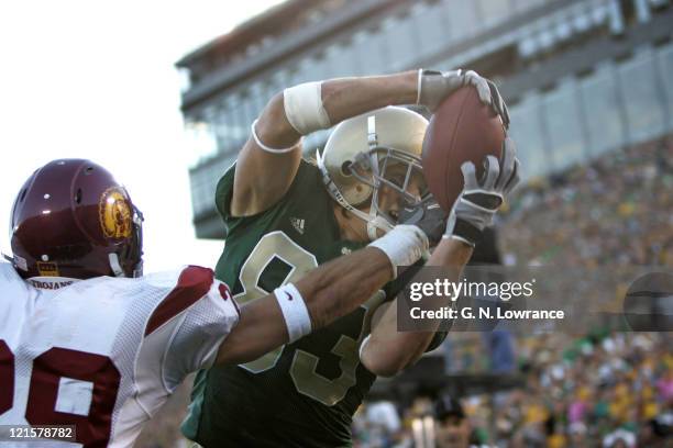 Jeff Samardzija of Notre Dame makes a reception against the USC Trojans at Notre Dame Stadium in South Bend, Indiana on October 15, 2005. USC won...