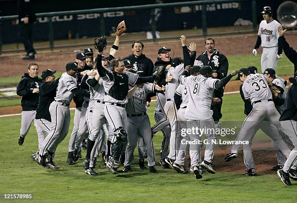 Members of the Chicago White Sox celebrate on the field after winning the 2005 World Series with a 1-0 win over the Houston Astro's at Minute Maid...