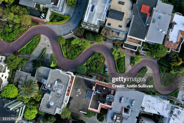 An aerial drone view of an empty Lombard Street tourist destination during the coronavirus pandemic on March 30, 2020 in San Francisco, California....