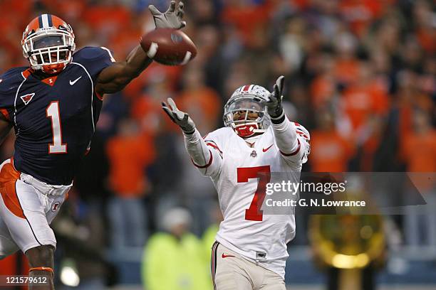 Ohio State receiver Ted Ginn Jr. Attempts to make a catch as Vontae Davis defends during action between the Ohio State Buckeyes and Illinois Fighting...