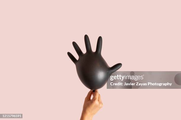 inflated disposable glove - handschuhe stock-fotos und bilder