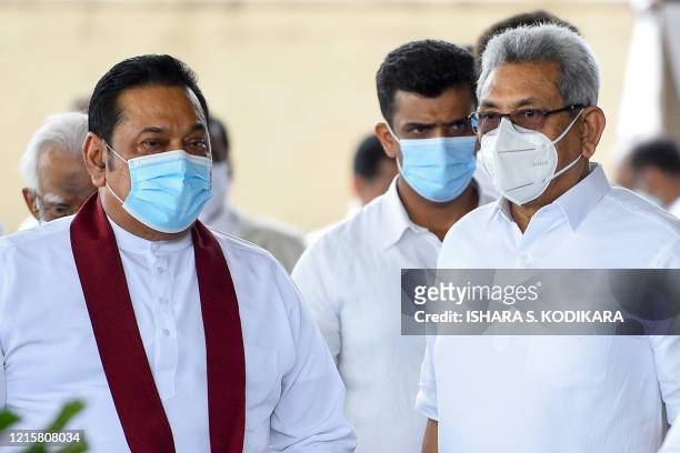 Sri Lanka's Prime Minister Mahinda Rajapaksa and President Gotabhaya Rajapaksa attend a laying in state ceremony for late tea plantation trade union...