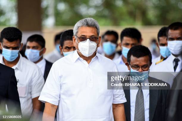 Sri Lanka's President Gotabhaya Rajapaksa arrives to attend a laying in state ceremony for late tea plantation trade union leader and government...