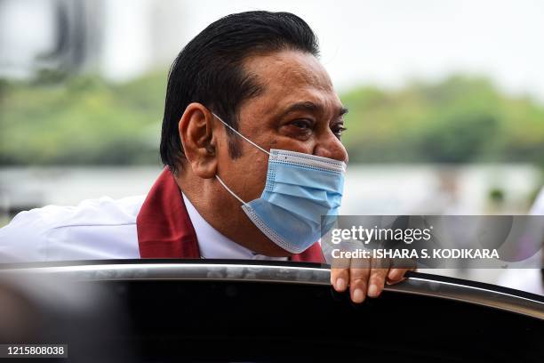 Sri Lanka's Prime Minister Mahinda Rajapaksa arrives to attend a laying in state ceremony for late tea plantation trade union leader and government...