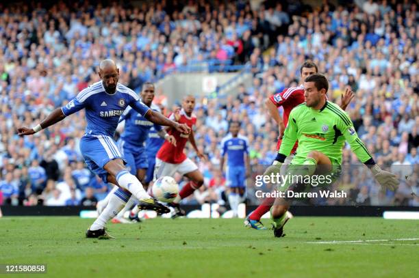 Nicolas Anelka of Chelsea shoots as Ben Foster of West Brom closes in during the Barclays Premier League match between Chelsea and West Bromwich...