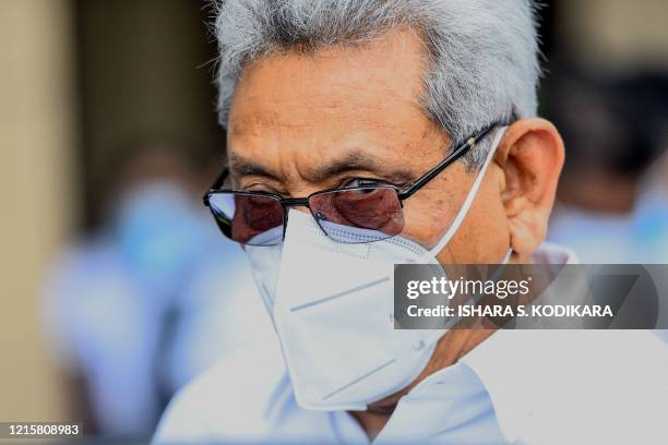 Sri Lanka's President Gotabhaya Rajapaksa arrives to attend a laying in state ceremony for late tea plantation trade union leader and government...