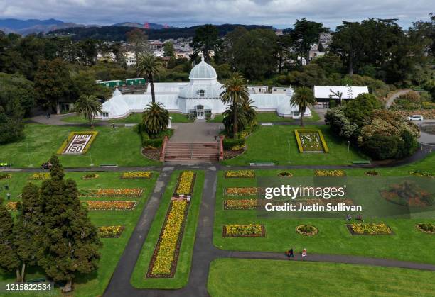 An aerial drone view of the nearly empty grounds of the Conservatory of Flowers in Golden Gate Park on March 30, 2020 in San Francisco, California....